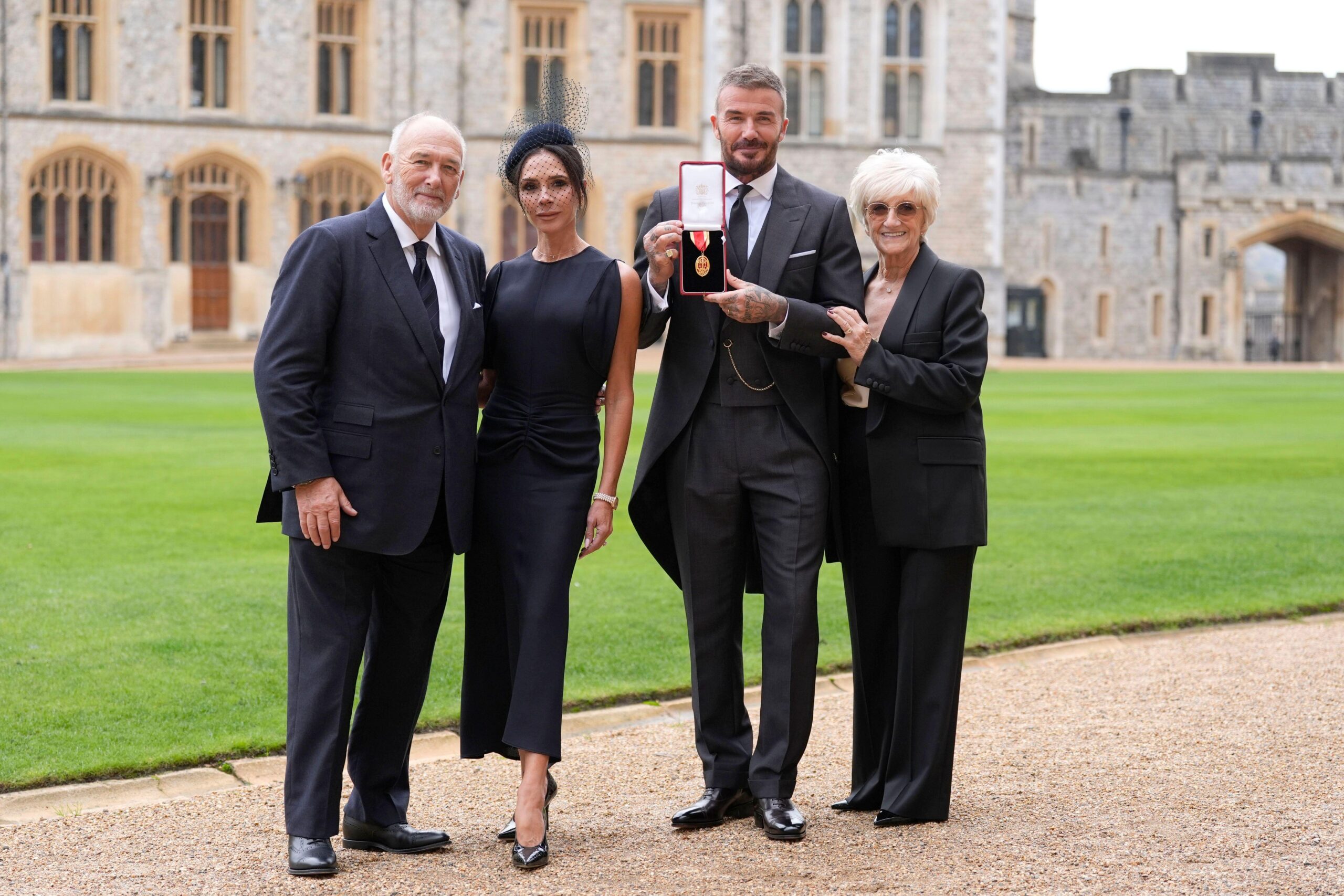 Sir David Beckham, with his wife Lady Victoria and parents Ted and Sandra Beckham, after he was made a Knight Bachelor at an investiture ceremony at Windsor Castle, Berkshire. Picture date: Tuesday November 4, 2025.